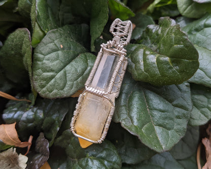 Silver mango quartz pendant
